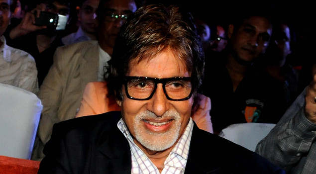 Indian Bollywood film actor Amitabh Bachchan smiles during the launch of producer T.P. Aggarwal's trade magazine 'Blockbuster' in Mumbai on July 8, 2012.  