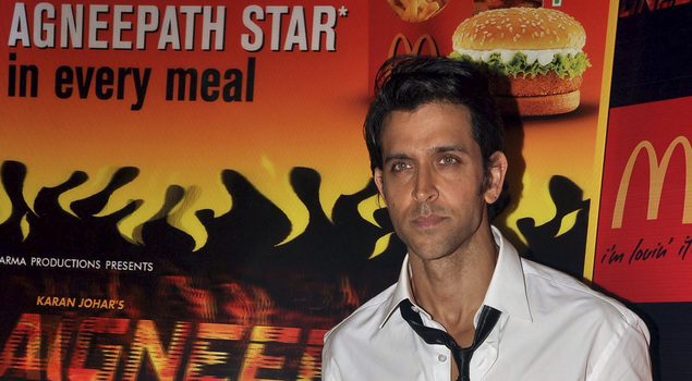 Hrithik Roshan poses during a promotional event for the forthcoming Hindi film 'Agneepath'