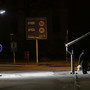 A woman walks past a border crossing point with Estonia in Valka
