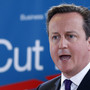Britain's PM Cameron addresses a news conference during a EU leaders summit in Brussels