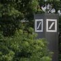 Logos of Deutsche Bank AG are seen in Tokyo