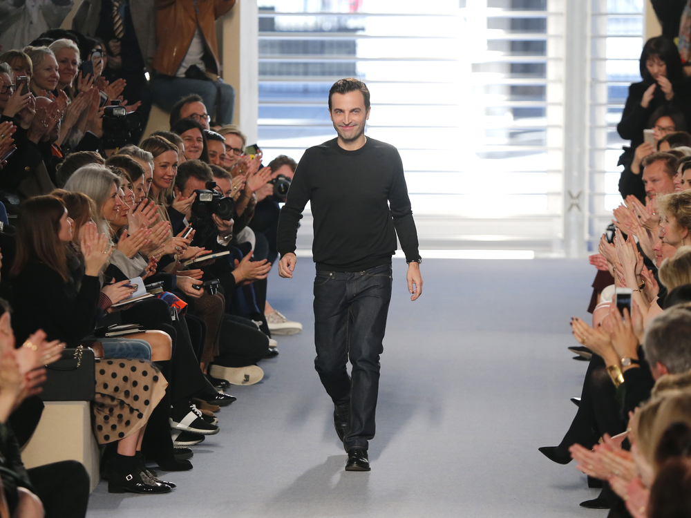Nicolas makes his understated bow at the finish (Picture: AP Photo/Jacques Brinon)