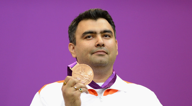 Bronze medallist Gagan Narang of India poses with the bronze medal won in the Men's 10m Air Rifle Shooting final final on Day 3 of the London 2012 Olympic Games at The Royal Artillery Barracks on July 30, 2012 in London, England. 